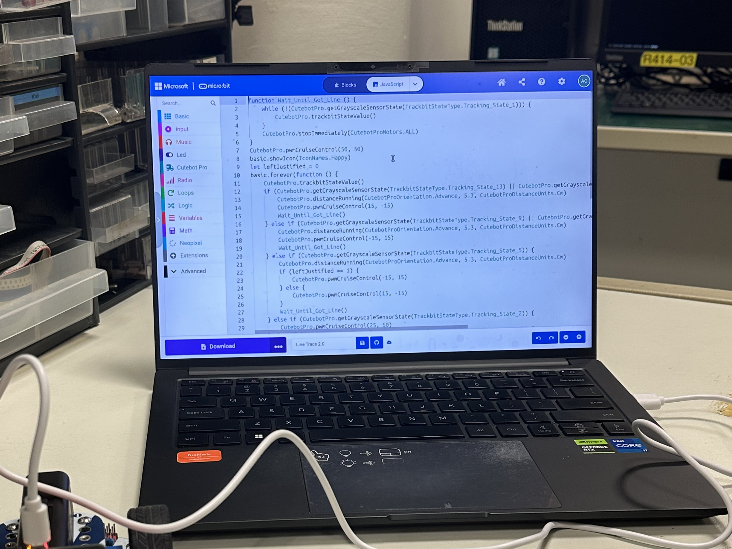 A computer showing some code on the screen.